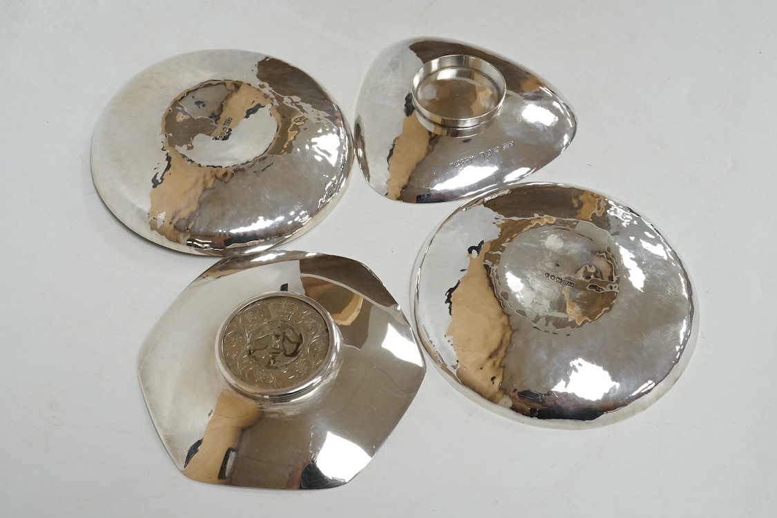 Three contemporary silver pin dishes including a planished pair by Paul Victor Markey, diameter 10.1cm and one by Robert Edgar Stone, together with a modern silver coin dish, 8.3oz.
